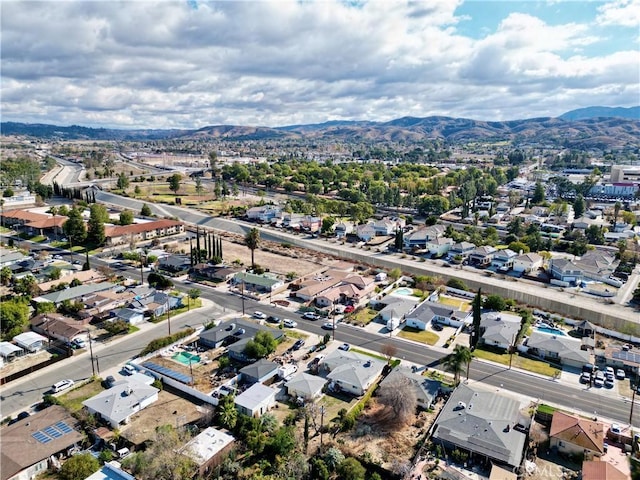 drone / aerial view featuring a mountain view