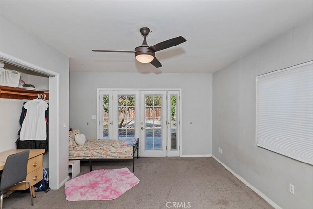 bedroom featuring french doors, carpet floors, a closet, ceiling fan, and access to exterior