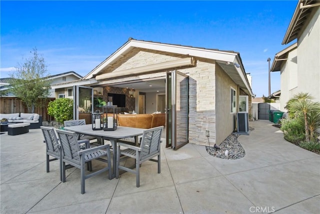 view of patio with outdoor lounge area