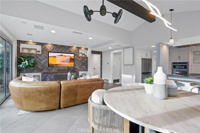 interior space with lofted ceiling with beams and tile walls