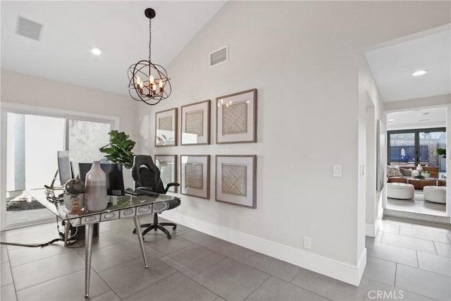 home office with lofted ceiling, a wealth of natural light, and an inviting chandelier