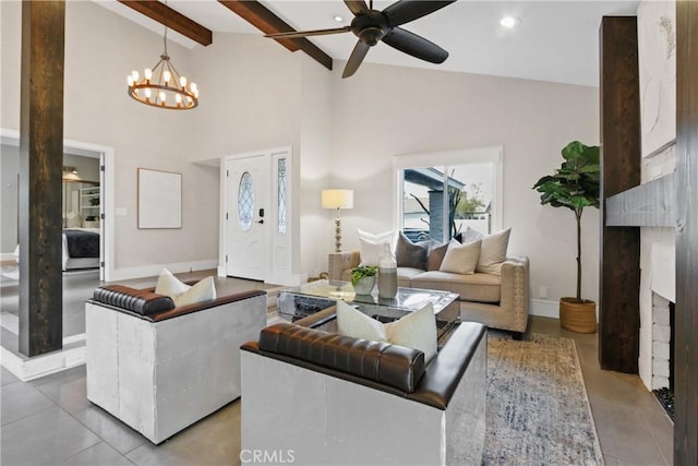 living room with ceiling fan, a premium fireplace, and lofted ceiling with beams