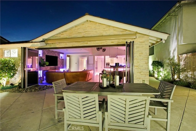 view of patio / terrace with exterior bar