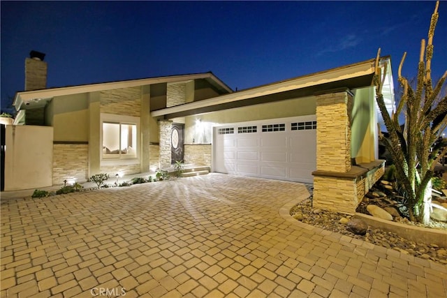 view of front of house with a garage