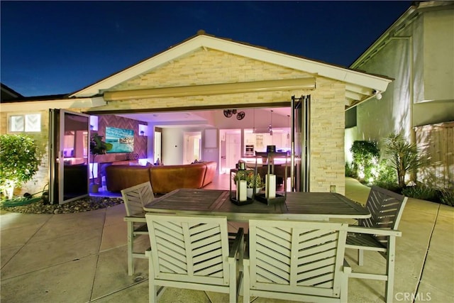 view of patio at night