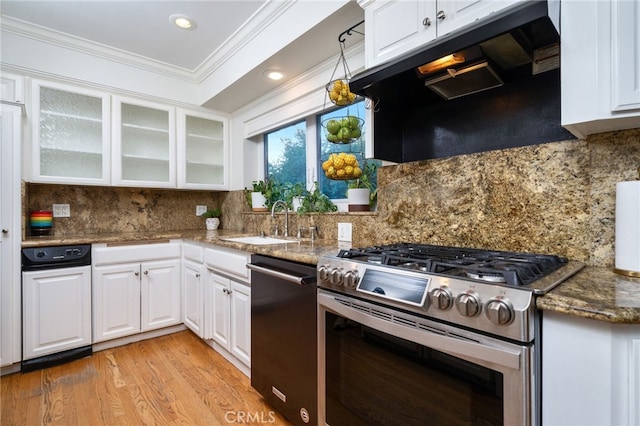 kitchen with extractor fan, white cabinetry, stainless steel range with gas cooktop, dishwasher, and decorative backsplash