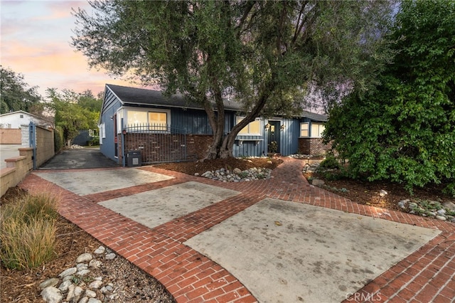 view of front of home featuring a patio area