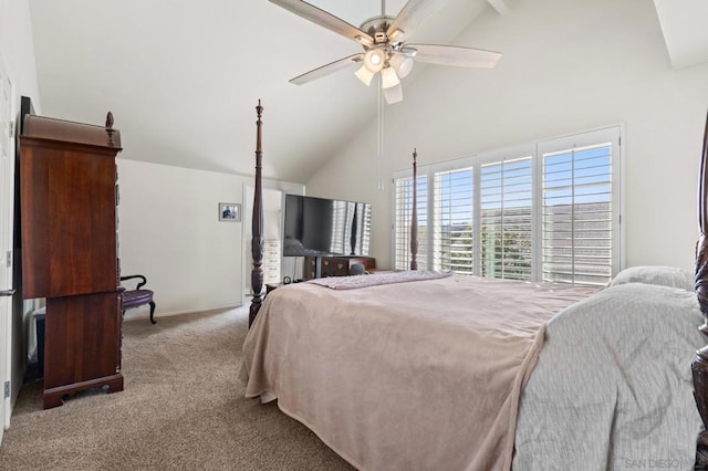 carpeted bedroom featuring ceiling fan and high vaulted ceiling