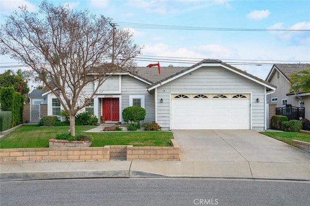 ranch-style home with a garage and a front lawn