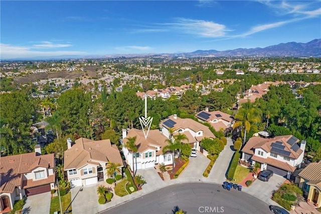 drone / aerial view featuring a mountain view