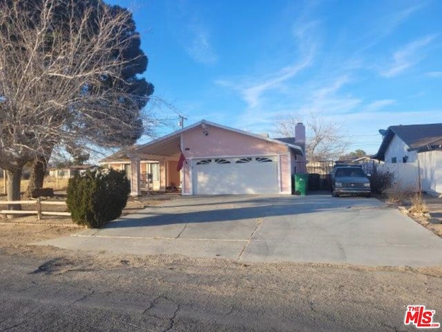 view of front of property featuring a garage