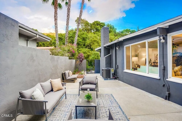 view of patio with cooling unit and an outdoor living space