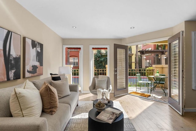 living room with light hardwood / wood-style flooring