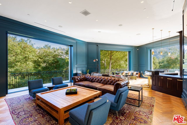 living room featuring light parquet flooring