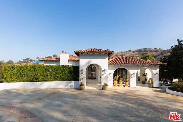 view of mediterranean / spanish-style house