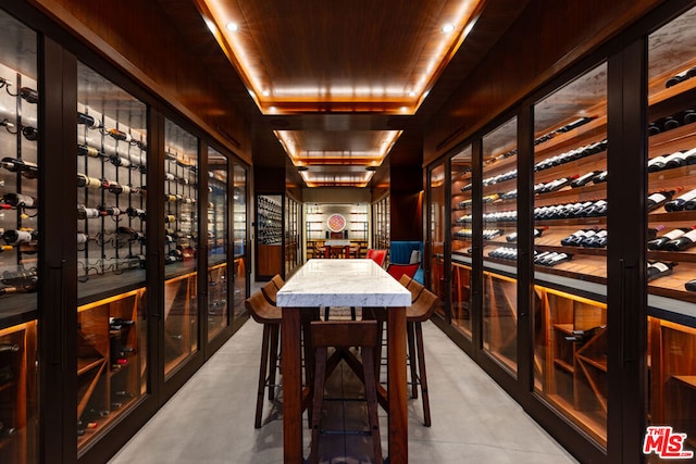 wine room featuring wooden ceiling