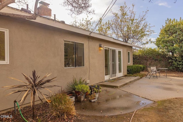 rear view of house featuring a patio