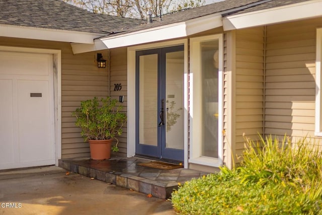 property entrance featuring french doors