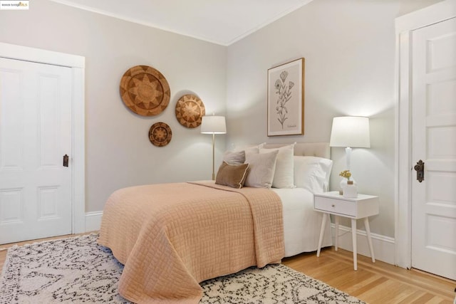 bedroom with hardwood / wood-style floors