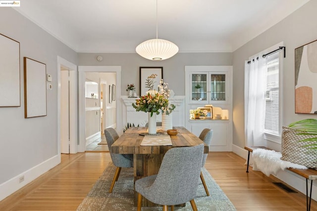 dining room featuring light hardwood / wood-style floors