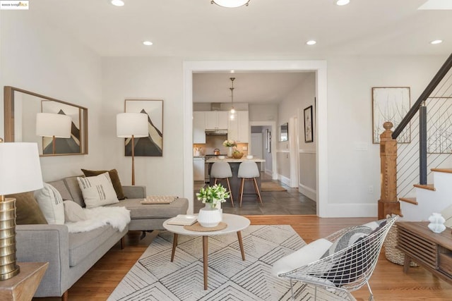 living room with light hardwood / wood-style floors