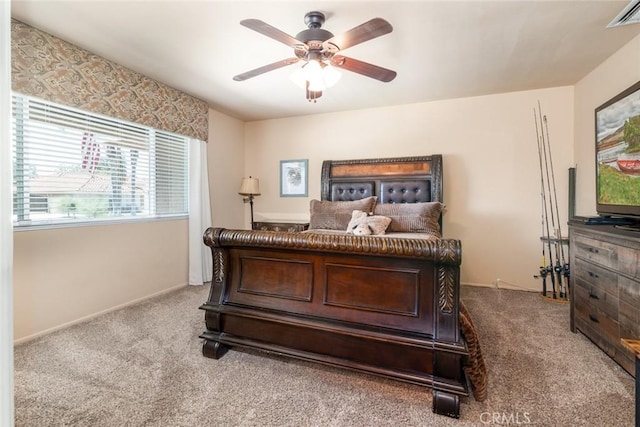 bedroom with light colored carpet and ceiling fan