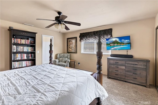 bedroom featuring light carpet and ceiling fan