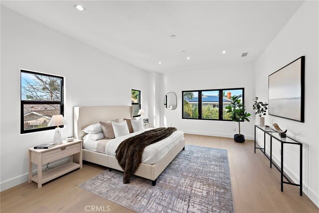 bedroom featuring light hardwood / wood-style floors