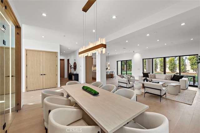 dining room with light wood-type flooring