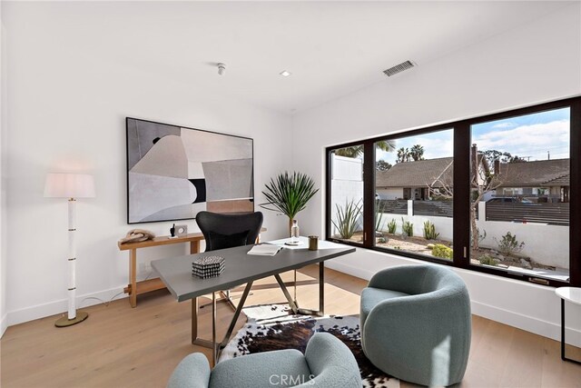 office space featuring light hardwood / wood-style flooring