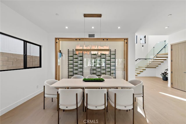 dining space featuring light hardwood / wood-style floors