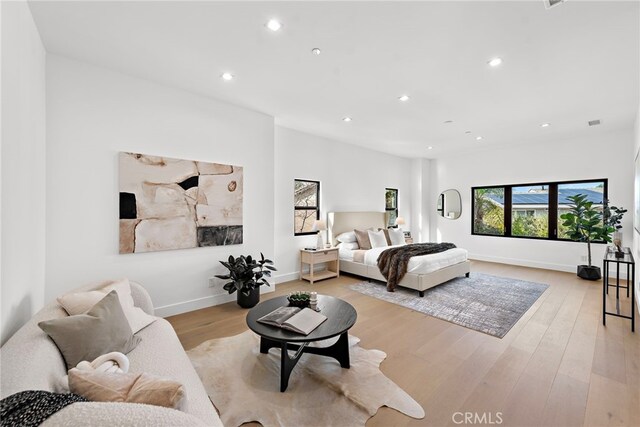 bedroom featuring light wood-type flooring