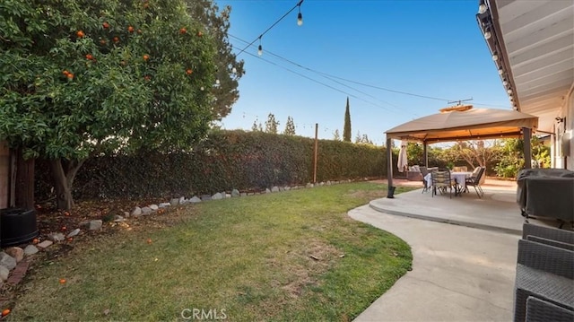 view of yard with a gazebo and a patio