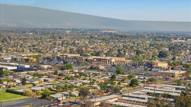 bird's eye view with a mountain view