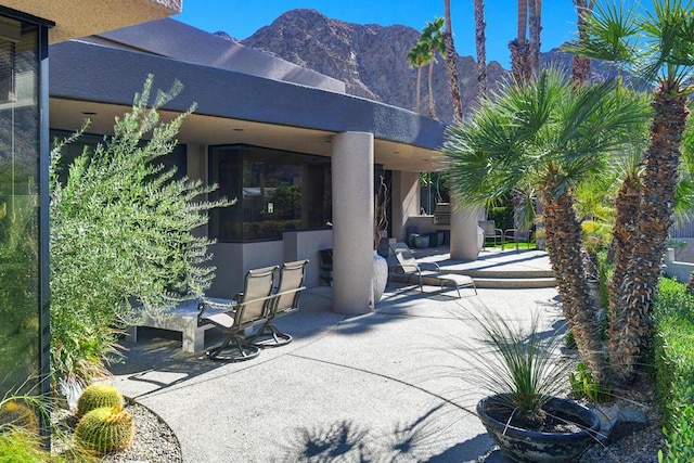 view of patio featuring a mountain view