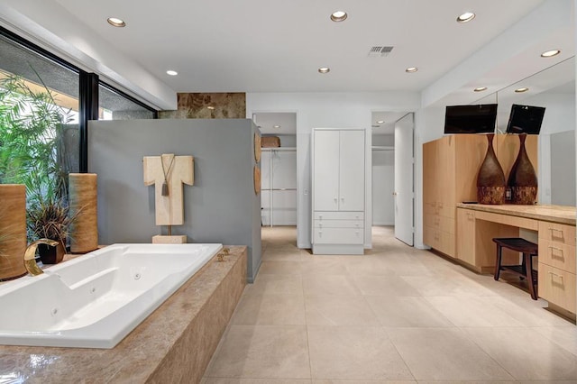 bathroom featuring separate shower and tub and tile patterned floors