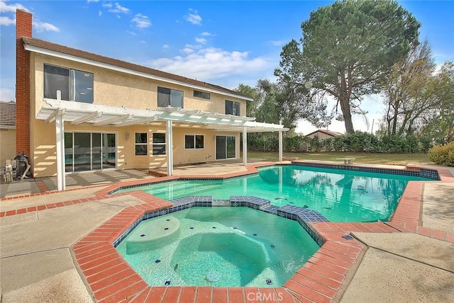 view of swimming pool with a pergola, a patio, and an in ground hot tub