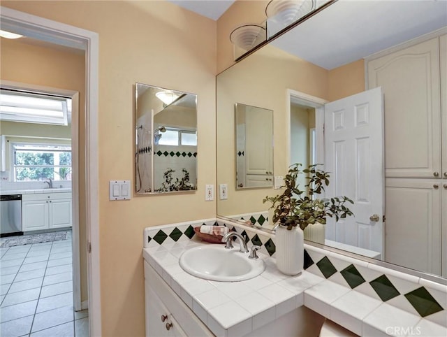 bathroom with vanity and tile patterned floors