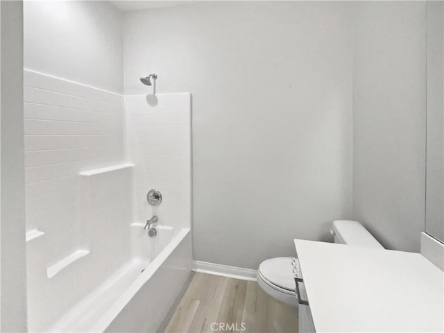 5393 Viewstone Ct, Hemet, CA 92545 - bathroom featuring wood finished floors, toilet, baseboards, vanity, and shower / bathtub combination