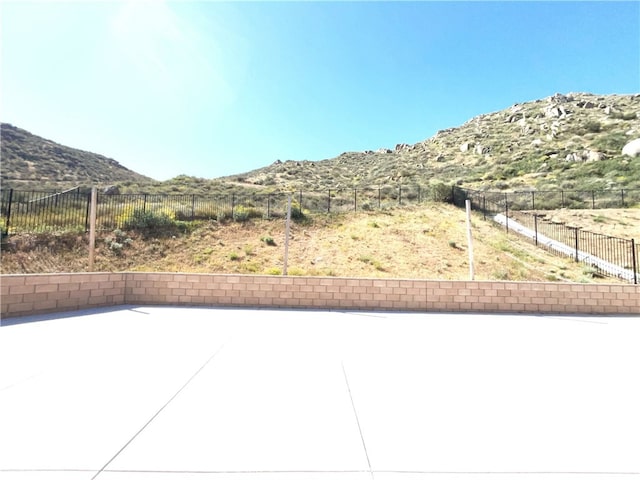 5393 Viewstone Ct, Hemet, CA 92545 - view of patio / terrace with a mountain view and a fenced backyard