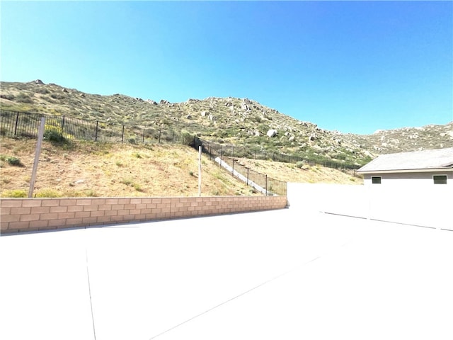 5393 Viewstone Ct, Hemet, CA 92545 - view of patio / terrace featuring a mountain view and fence