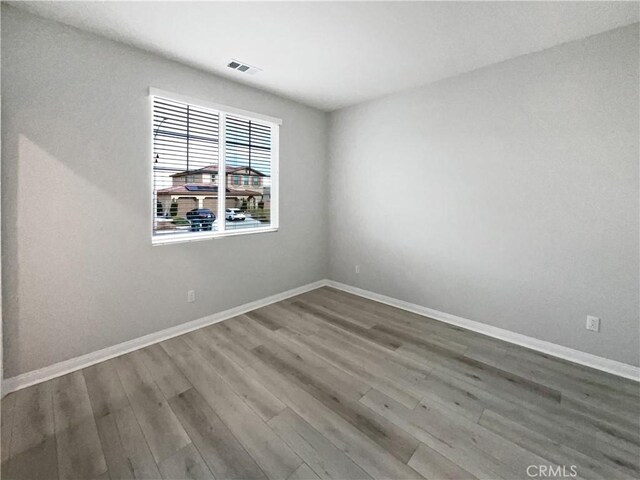 5393 Viewstone Ct, Hemet, CA 92545 - spare room featuring wood finished floors and baseboards