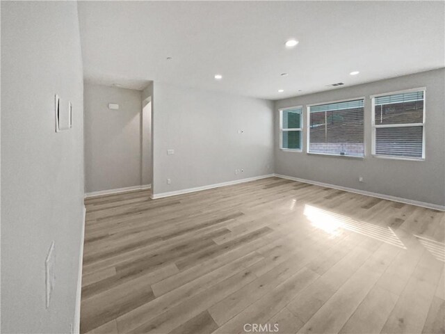5393 Viewstone Ct, Hemet, CA 92545 - unfurnished room with light wood-style flooring, baseboards, and recessed lighting