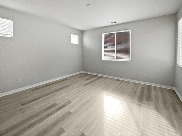 5393 Viewstone Ct, Hemet, CA 92545 - empty room with light wood-style flooring and baseboards