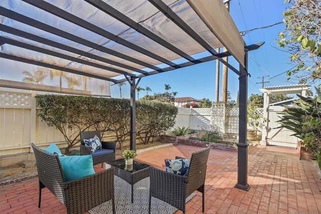 view of patio / terrace featuring an outdoor living space and a pergola