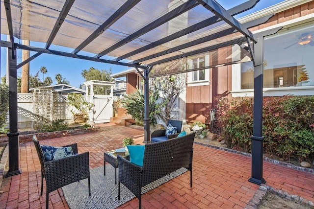 view of patio / terrace with a pergola and outdoor lounge area