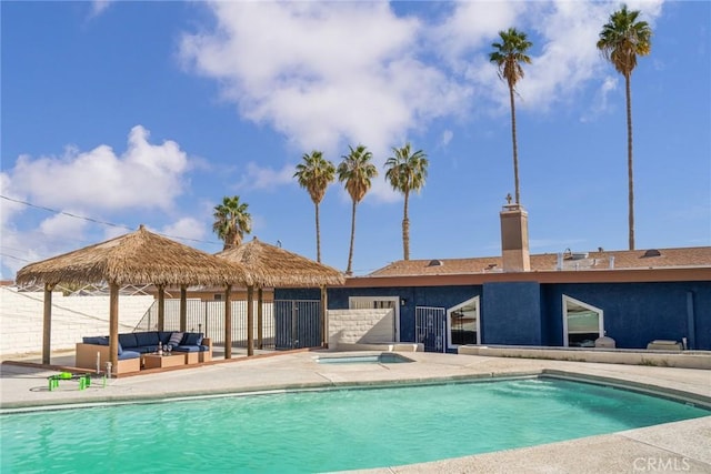 view of pool with outdoor lounge area and a patio area