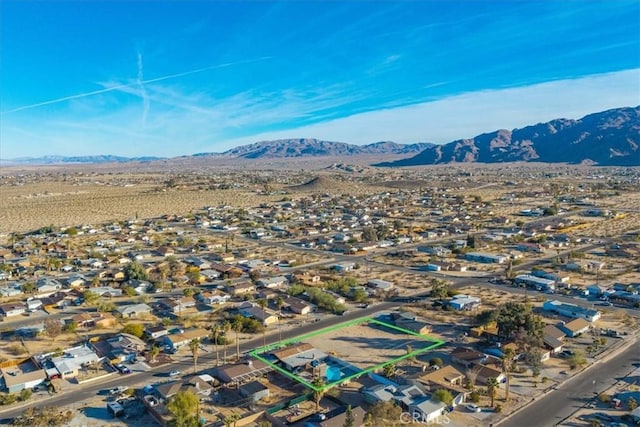 drone / aerial view featuring a mountain view