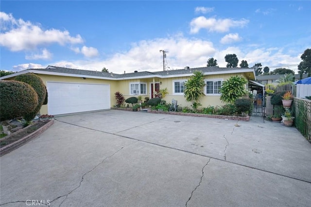 ranch-style home with a garage