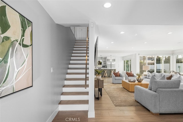 living room with light hardwood / wood-style floors